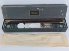 A William Evans Gun and Rifle Makers gun cleaning kit including barrel oil, rangoon oil, gun grease,