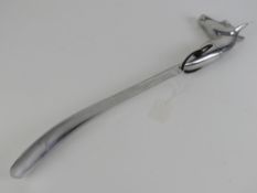 A contemporary aluminium shoe horn in the form of a horses head, 52cm in length.