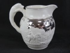 A Wedgwood of Etruria and Barlaston large cream jug having hunting scene in relief with silver
