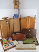 Two artists freestanding easel paint boxes, Julian of Paris and Maybeth of Italy,