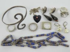 A quantity of assorted silver and white metal jewellery including sterling silver bangle,