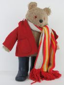 A vintage Paddington Bear teddy bear with duffel coat and boots, a/f, standing 46cm high.