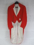 A Tipperary Hunt MFH hunting pink tailcoat having full complement of twelve (6+6) brass buttons.