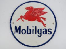 A cast metal Mobilgas sign, 24cm dia.