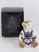Royal Crown Derby Paperweight; 'School Girl Teddy', gold stopper or button, with box.