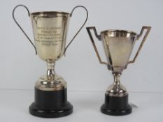 Two silver plated trophy cups,