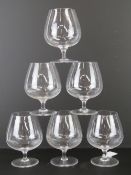 A set of six large Stewart Crystal brandy balloons, each standing 14.5cm high.