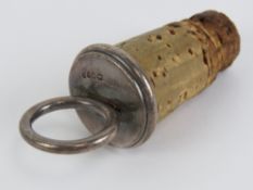 A Victorian HM silver bottle stopper having ring top, hallmarked London 1880, 8.5cm in length.
