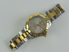 A Tag Heuer ladies stainless steel Aquaracer wristwatch model WAF 1420,