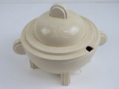 A Clarice Cliff Stamford Creamware stylised tureen and cover, 22cm high.