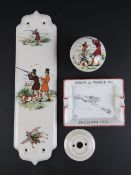 A ceramic door handle having shooting theme upon together with matching ceramic door plate.