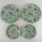A quantity of assorted famille rose plates; two 18cm dia, one 25cm dia and one 26cm dia.