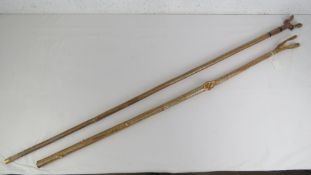 Two split top walking canes, 47