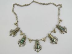 A silver and abalone shell necklace having filigree and floral panels, 43.5cm in length.