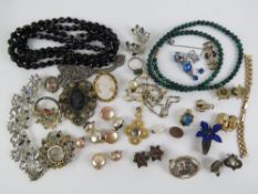 A quantity of assorted vintage costume jewellery including french jet bead necklace,