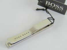 An as new Hugo Boss tie clip in box with label, RRP £59.
