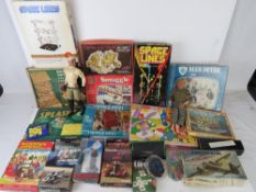 A quantity of vintage toys and puzzles including two Action Man dolls,