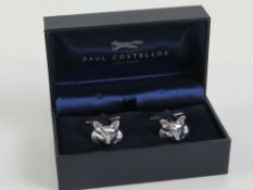 A pair of Paul Costello fox head cufflinks, 'as new' in presentation box.