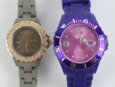 An Identity London stainless steel and grey rubberised wristwatch.