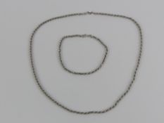 A 9ct white gold rope twist chain necklace with matching 9ct white gold bracelet,