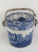 A blue and white Copeland Spode slop pail having wickerwork handle.