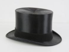 A William Anderson Edinburgh and Glasgow silk top hat, size 7.25.