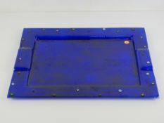 A Murano art glass tray of rectangular form in cobalt blue with floral cabachons to border,
