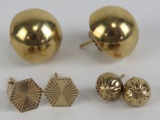 A pair of 9ct gold domed stud earrings, hallmarked 375,