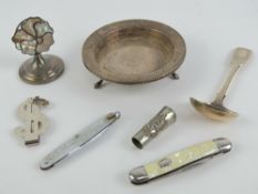 A HM silver dish raised over three paw feet, 10.5cm dia, hallmarked Birmingham 2000, 2.83ozt.