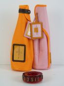 Two Veuve Cliquot bottle jackets for Brut and Rose.