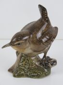 A ceramic Wren as made by Quail and being a salt cellar, 8cm high.