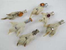 A HM silver mounted 'lucky' grouse foot brooch having Scottish hallmark to back with Thistle emblem