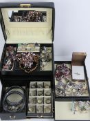 A quantity of assorted silver and costume jewellery within a faux crocodile skin jewellery box,