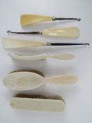 A 19th century ivory backed hair brush, clothes brush, crumb scoop,