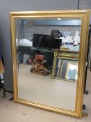 A good contemporary bevel edged wall mirror, 106 x 157cm.