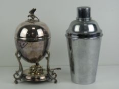An unusual silver plated breakfast four sectional boiled egg warmer having spirit burner under,