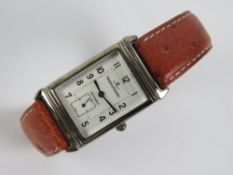 A c1990s Jaeger Le Coultre stainless steel Reverso quartz wristwatch,