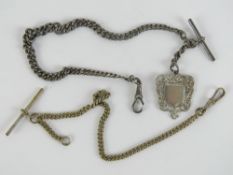 A HM silver graduated Albert chain with T-bar and clasp having albo silver fob upon,