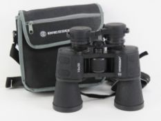A pair of Bresser 10x50 binoculars in 'as new' condition, in case with instructions.