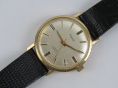 A 1980s 9ct gold Rone wristwatch on black strap, hallmarked 375,