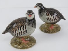 A pair of ceramic Quail condiments being a salt and a pepper, each standing 8cm high,