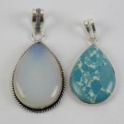 A large teardrop shaped moonstone pendant stamped 925 and measuring 5.5cm in length.