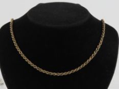 A 9ct gold rope twist chain necklace measuring 49.5cm in length, hallmarked 375, 7.4g.