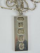 A HM silver ingot necklace having silver jubilee hallmarks to front upon 925 silver box link chain,