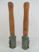 Two inert German stick grenades.