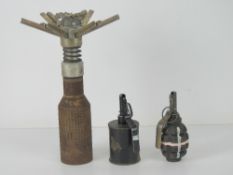 An inert RG42 grenade, together with ine