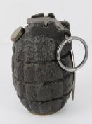 An inert WWII British Mills grenade.