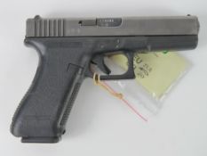A deactivated Glock 17 9mm pistol, with