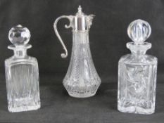 Two heavy cut glass square shaped decant