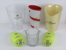 Three champagne ice buckets for; Mumm, M